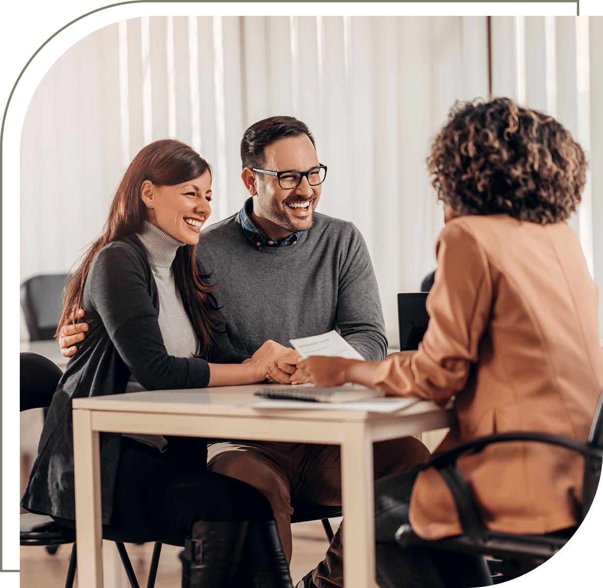 Couple meeting with a professional advisor.
